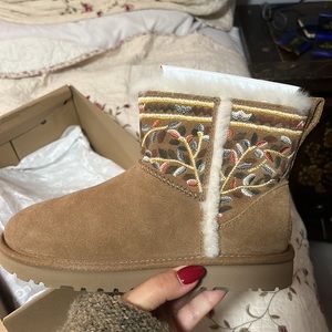 Size five embroidered Uggs